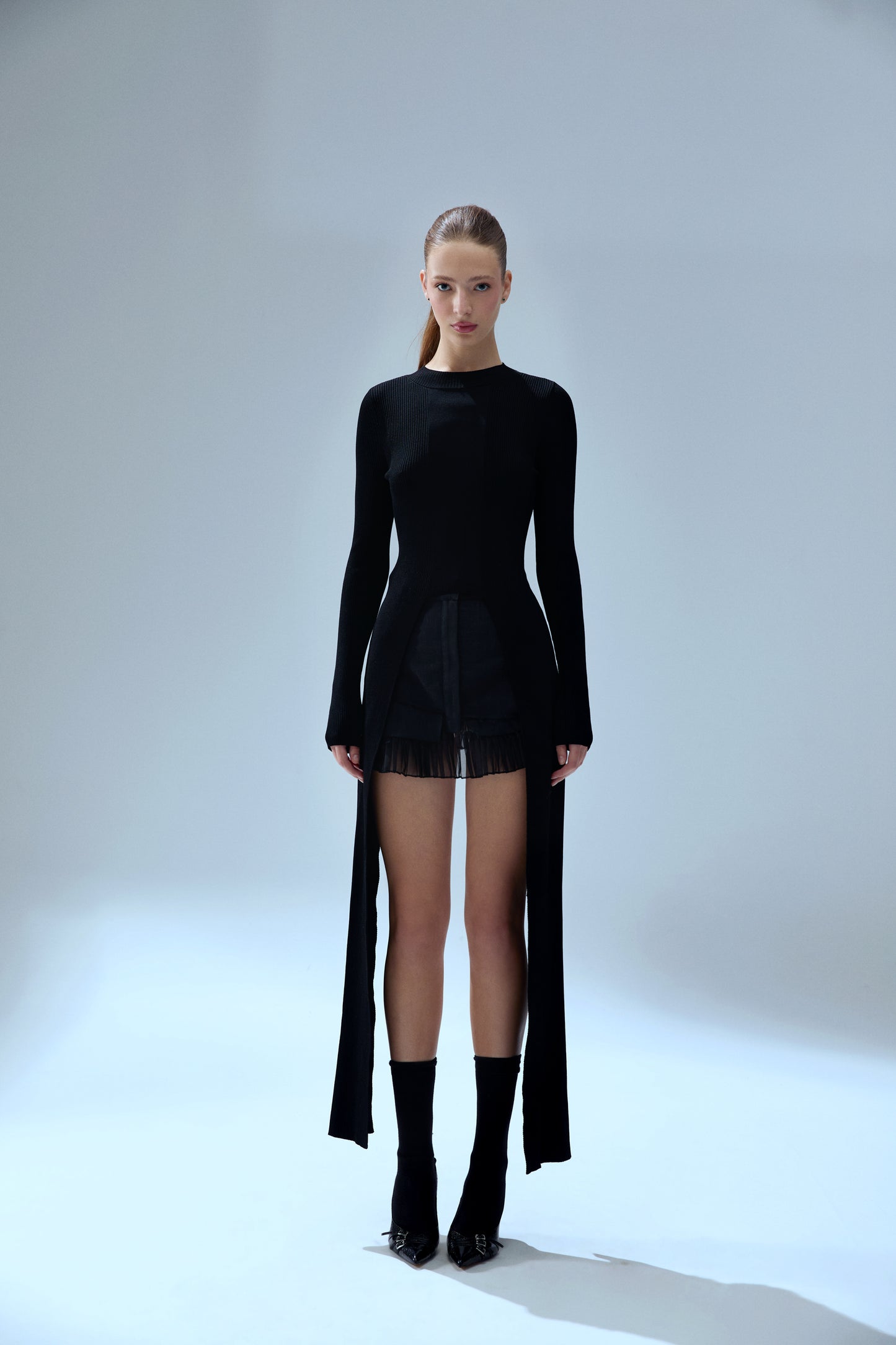 Your *itch Tailed Knit Top